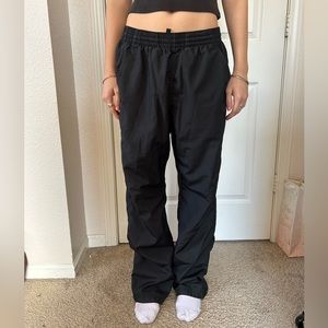 black nylon Under Armor track pants